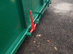 Déverrouillage latéral déporté